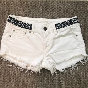 3/$20  White jean shorts with black beaded waist